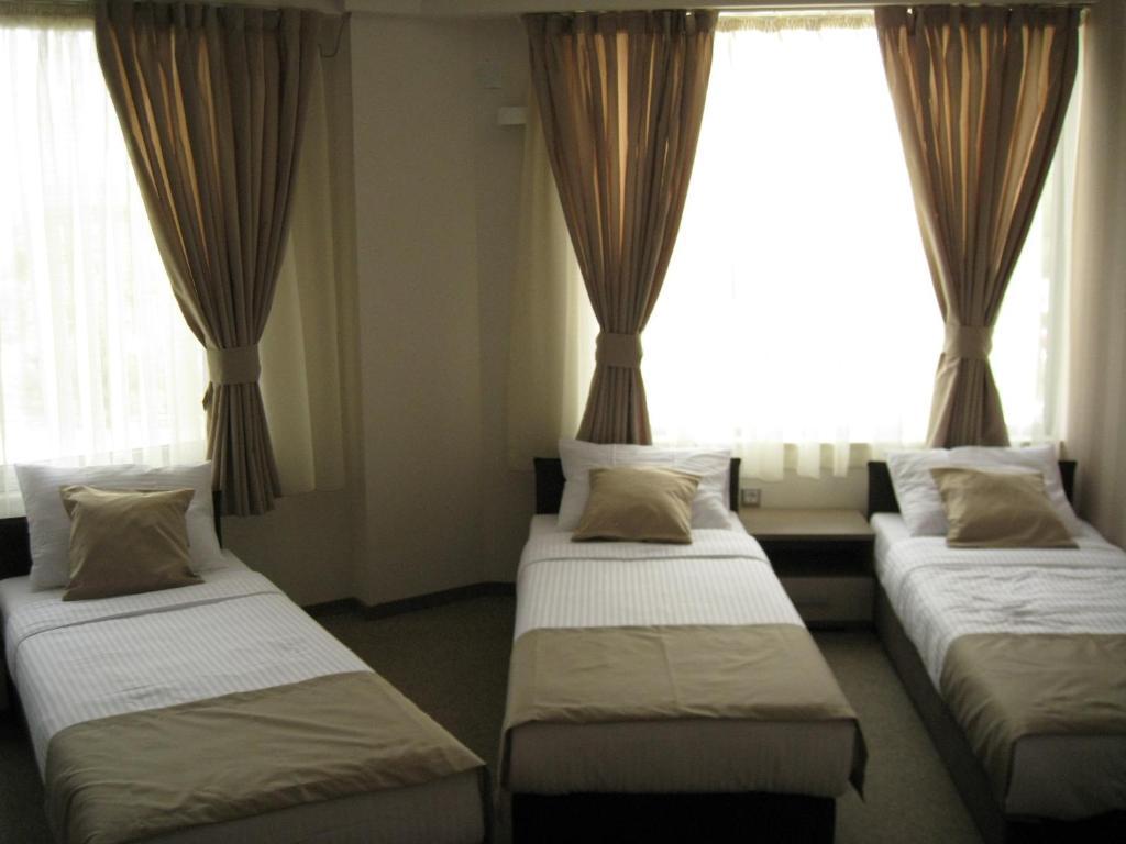 Domus Aparthotel Escópia Quarto foto