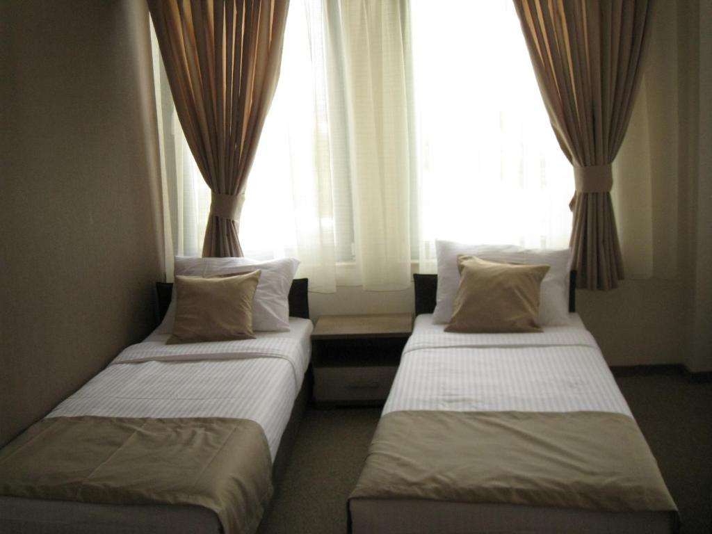 Domus Aparthotel Escópia Quarto foto