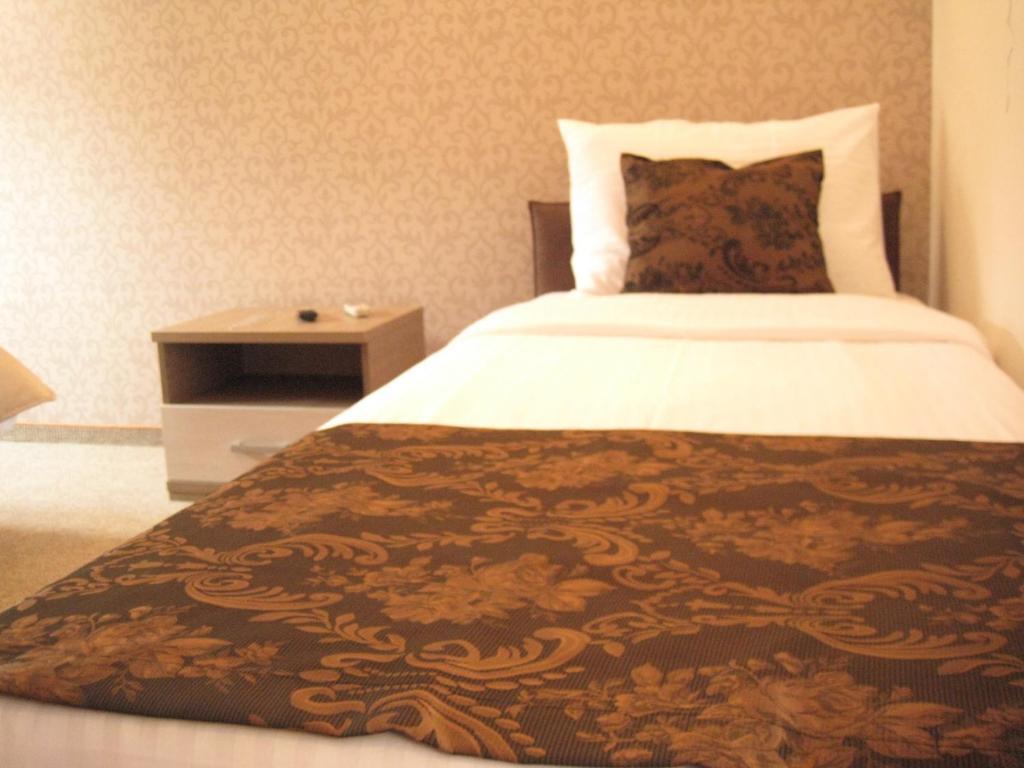Domus Aparthotel Escópia Quarto foto