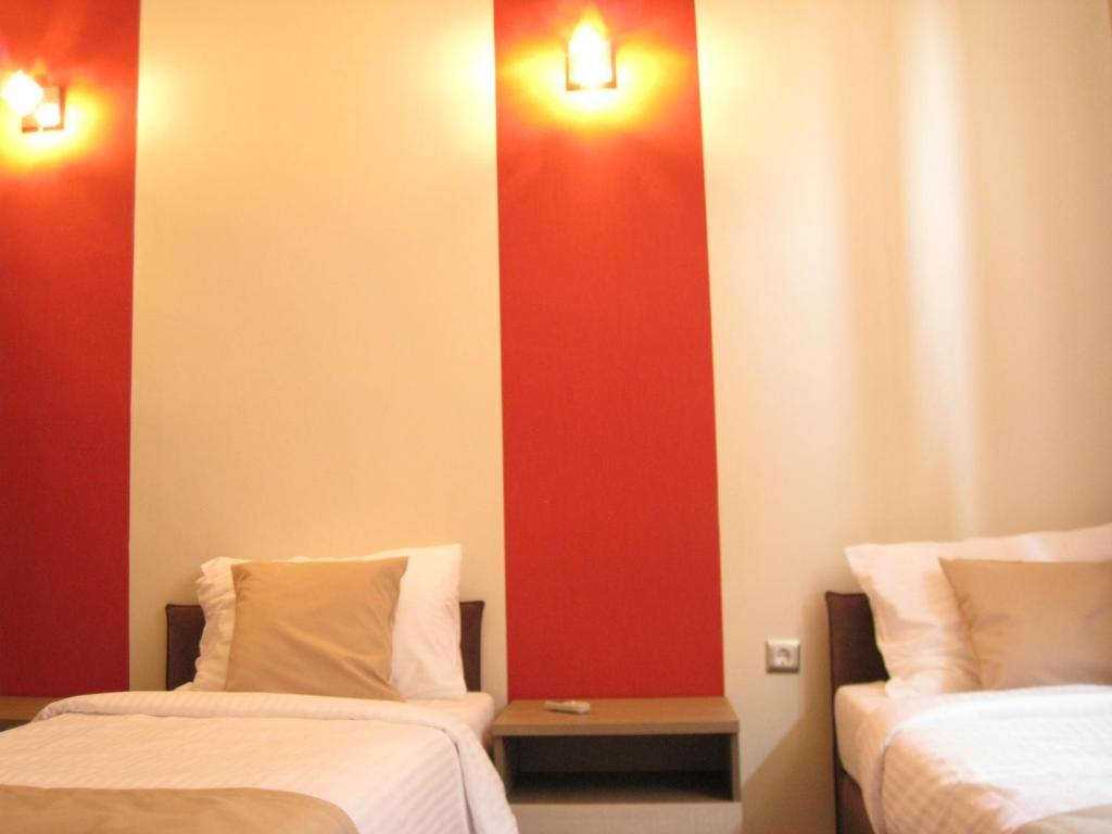 Domus Aparthotel Escópia Quarto foto