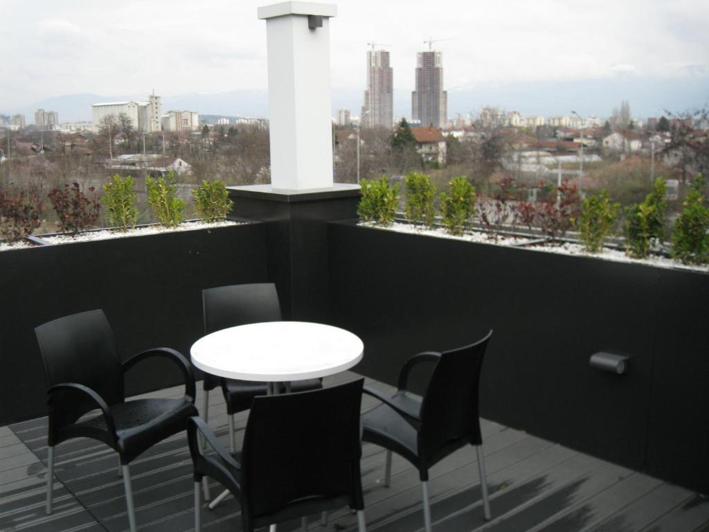 Domus Aparthotel Escópia Quarto foto